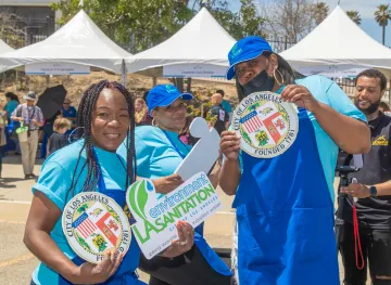 LASAN staff enjoy the free 360 degree photo booth at Earth Day LA