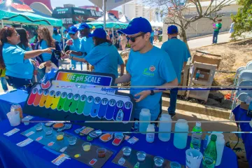 LASAN staff display a pH chart to help explain our laboratory work at Earth Day LA